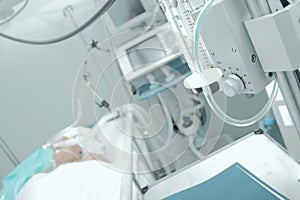 Patient receiving mechanical ventilation in a hospital