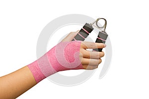 patient's hand with hand grip exercise