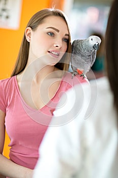 Patient's owner listening to the advices of veterinarian in vet