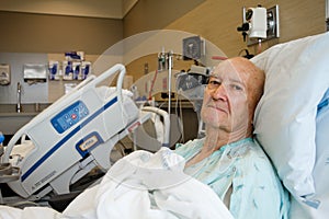 Patient Sitting Up in Modern Hospital Room