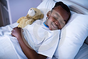 Patient sleeping with teddy bear