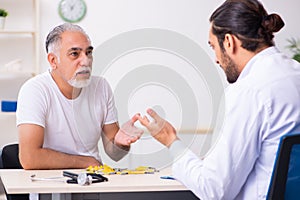 Patient suffering from diabetes visiting doctor