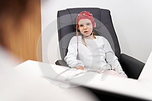 Patient talking to the doctor during a biofeedback session