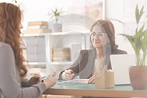 Patient talking to psychiatrist photo