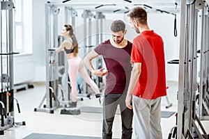 Patient with therapist at the rehabilitation gyum