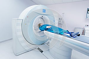 Patient undergoing CT - Computerized Tomography Scan Device