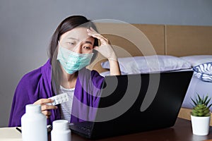 Patient use remote distance video conference, make online consultation with doctor on laptop computer application about illness