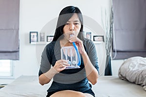 Patient using incentive spirometer or three balls for stimulate lung