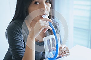 Patient using incentivespirometer or three balls for stimulate lung