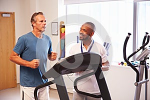 Patient Using Treadmill In Hospital Physiotherapy Department