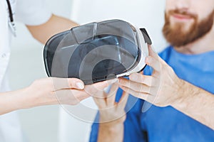 Patient using virtual reality glasses