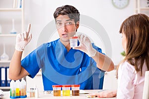 The patient visiting doctor for urine test