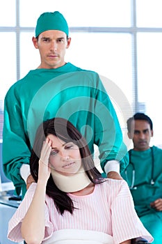 Patient wearing a neck brace