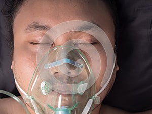 patient wearing oxygen mask.