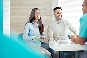 Patients consulting the dentist at dental clinic