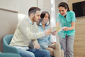 Patients consulting the dentist at dental clinic