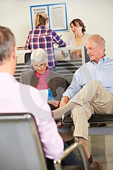 Patients In Doctor's Waiting Room