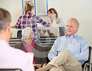 Patients In Doctor's Waiting Room