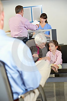 Patients In Doctor's Waiting Room