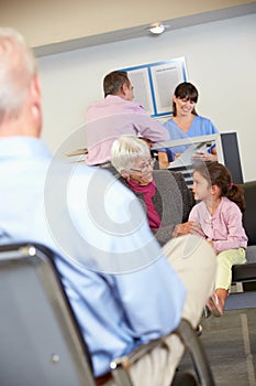 Patients In Doctor's Waiting Room