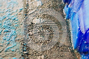 Patina and crystals of blue vitriol on copper plates anodes of galvanic installation close-up