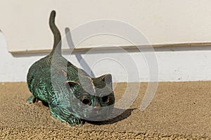 Patinated bronze cat statue