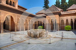 Patio de los Leones inside of the Nasrid palace of Alhambra fortress in Granada, Spain