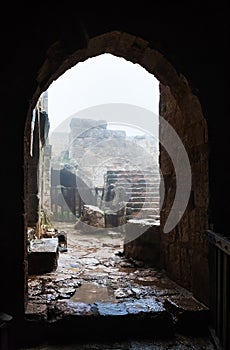 Patio in medieval Ajlun castle in Jordan in rain