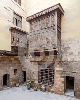 Patio of ottoman historic house of El Sehemy with wooden oriel windows photo