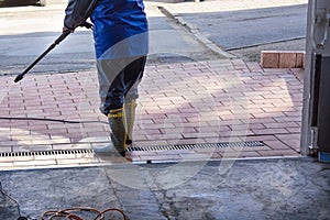 Pavement cleaning with high pressure washer