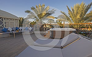 Patio roof terrace of luxury hotel resort room with hot tub