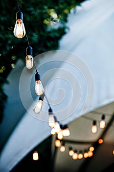 Patio wedding and holiday lights on street
