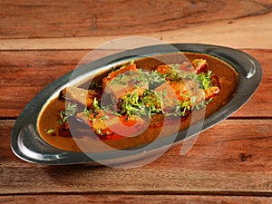 Patodi Rassa Bhaji or patwadi Sabji, a popular Maharashtrian spicy recipe served with Chapati and salad. Selective focus