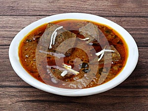 Patodi Rassa Bhaji or patwadi Sabji, a popular Maharashtrian spicy recipe served with Chapati and salad. Selective focus