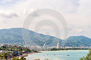 Patong Beach coastline viewed from Kalim Bay in the morning photo