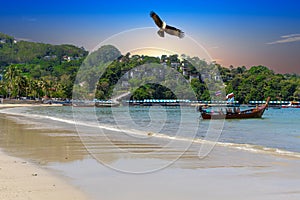 Patong Beach Phuket Thailand nice white sandy beach clear blue and turquoise waters and lovely blue skies