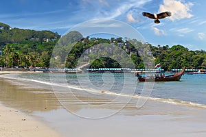 Patong Beach Phuket Thailand nice white sandy beach clear blue and turquoise waters and lovely blue skies