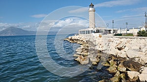 patra lighthouse greece ionio sea in sunny winter day photo