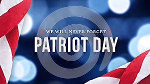 Patriot Day - We Will Never Forget Text Over Blue Bokeh Lights Texture Background and American Flags photo
