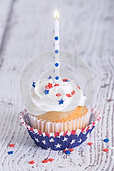 Patriotic 4th of July cupcake with candle