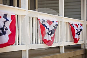 Patriotic Bunting Hanging from Front Porch