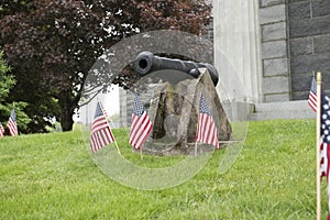 Patriotic Canon Display with American flags