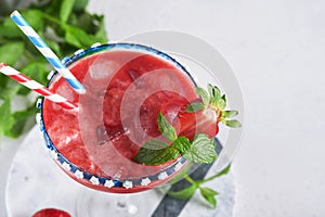 Patriotic Cocktail 4th july. Glass margarita cocktail with strawberry, mint and iced. Drinks for American Independence Day