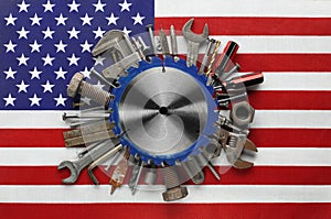 Patriotic collection of worn and used tools on US American flag. Made in USA, American workforce, or Labor Day concept