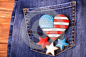 Patriotic cookie on a back pocket of jeans