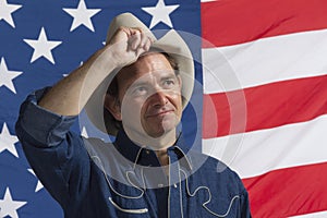 Patriotic cowboy taking off hat, horizontal