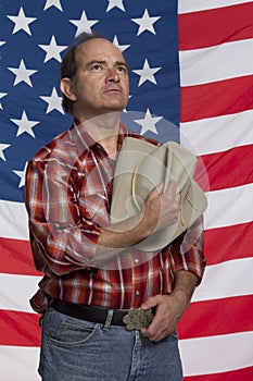 Patriotic cowboy taking off hat, horizontal
