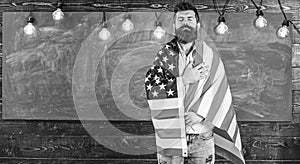 Patriotic education concept. Teacher teaches to love homeland, USA. Man with beard and mustache on serious face with