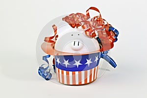 Patriotic piggy bank in a stars and stripes hat