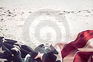 Patriotic symbolism. American flag on wooden background